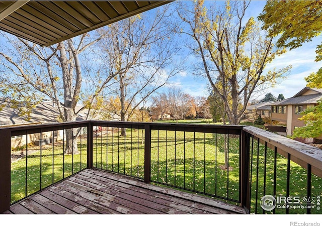 deck featuring a lawn