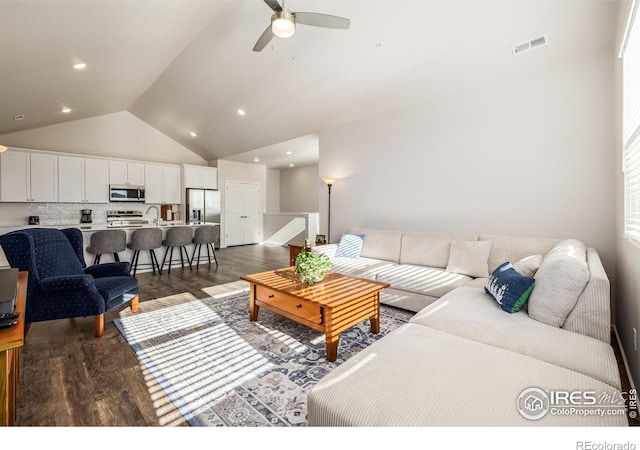 1820 Iron Wheel Dr Unit 3, Windsor, CO 80550 - living room with a ceiling fan, dark wood finished floors, and high vaulted ceiling