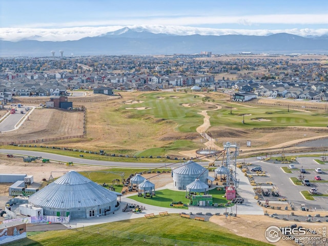 birds eye view of property featuring a mountain view