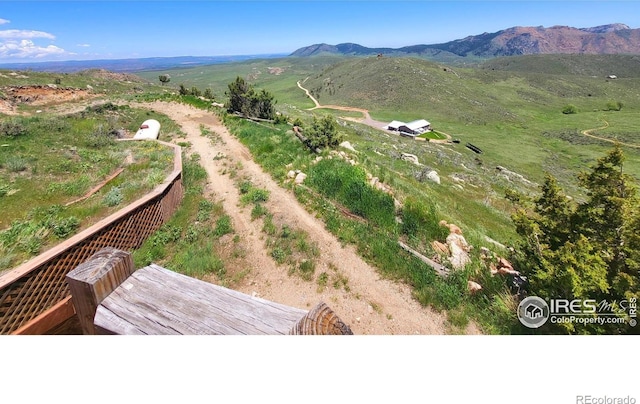 drone / aerial view featuring a mountain view