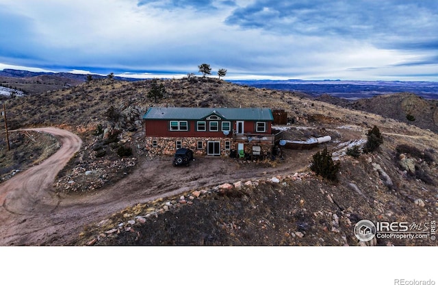 exterior space featuring a mountain view