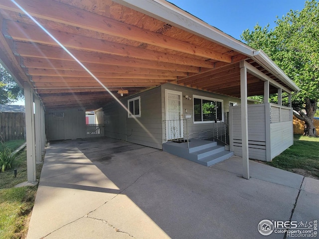 view of front of property with a carport