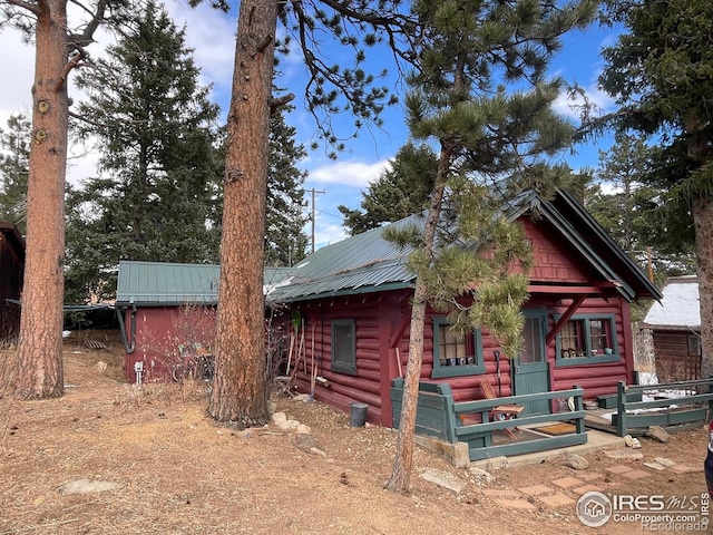 view of log cabin