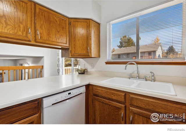 kitchen featuring dishwasher and sink