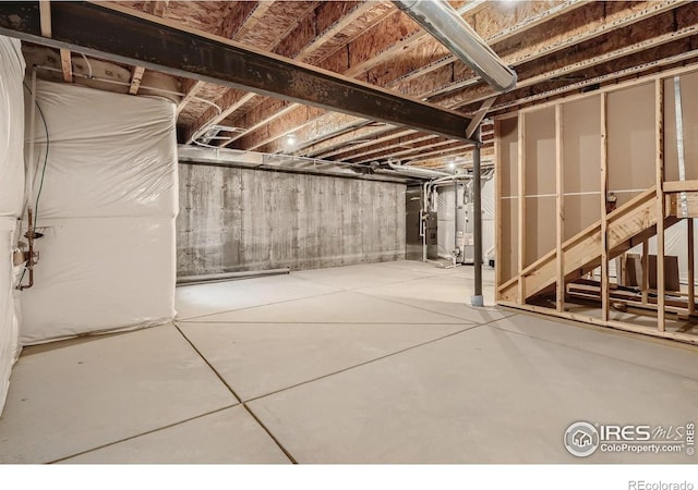 basement featuring gas water heater