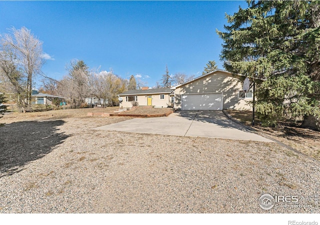 single story home with a garage