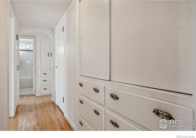 hallway featuring light hardwood / wood-style flooring