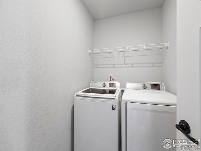 laundry room featuring washer and dryer