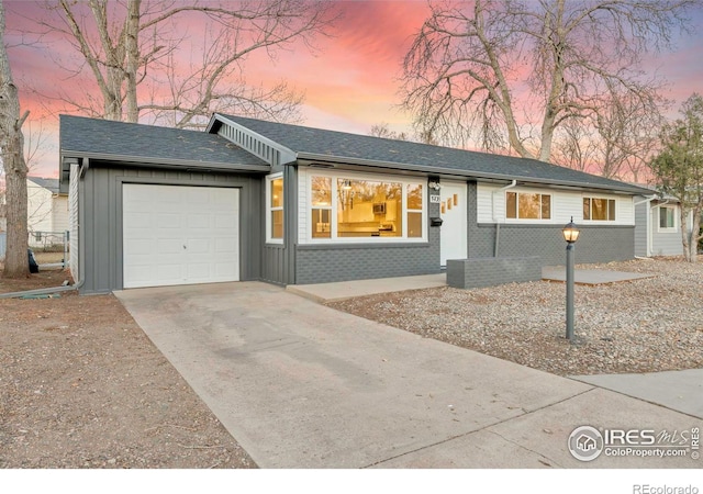 ranch-style home with a garage