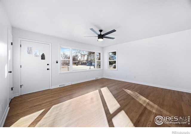 entrance foyer featuring ceiling fan and wood-type flooring