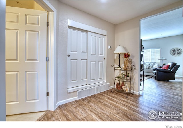 hallway featuring light hardwood / wood-style floors