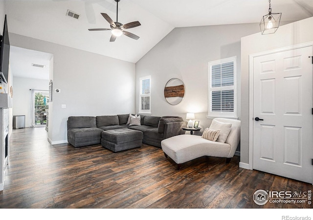 living room featuring ceiling fan, high vaulted ceiling, and dark hardwood / wood-style floors