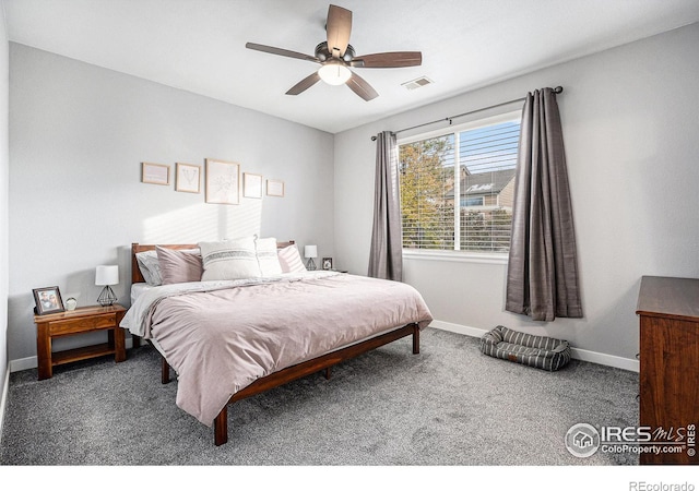 carpeted bedroom featuring ceiling fan