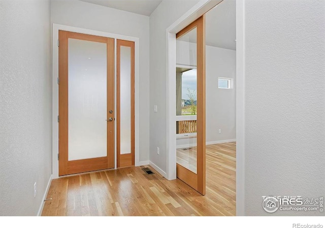 foyer featuring light hardwood / wood-style flooring