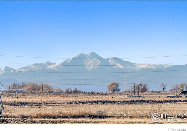 view of water feature with a mountain view and a rural view