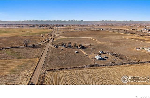 bird's eye view featuring a mountain view and a rural view