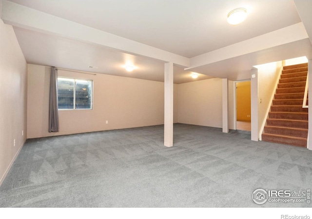 basement with light colored carpet