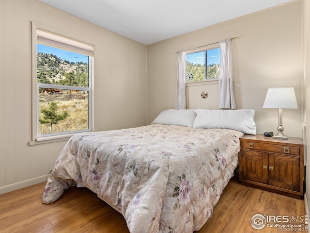 bedroom with light wood-type flooring