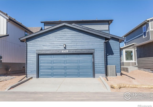 6105 Saddle Horn Dr, Timnath, CO 80547 - garage with concrete driveway