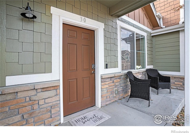 entrance to property with a porch