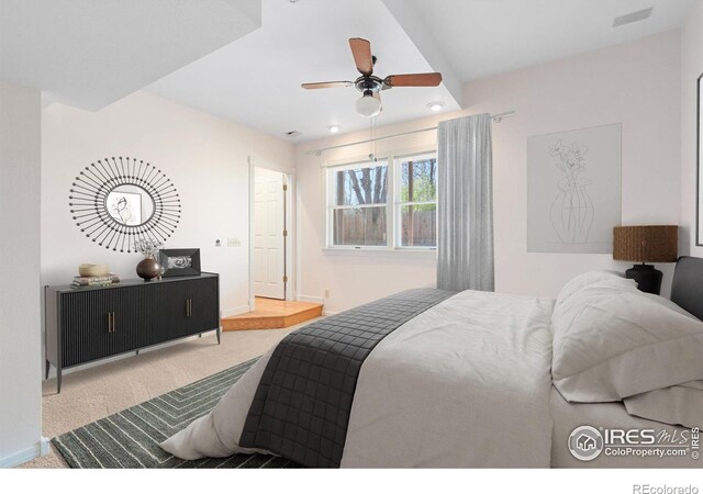 carpeted bedroom featuring ceiling fan