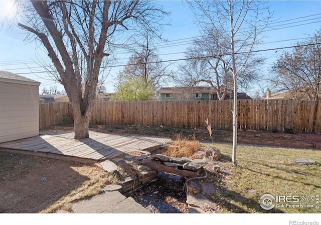 view of yard featuring a deck