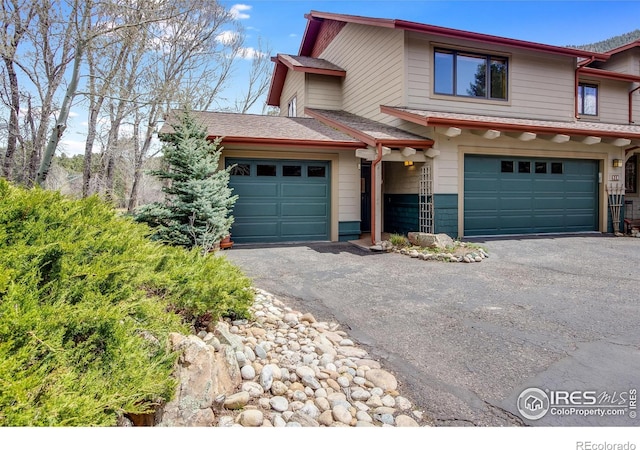 front facade with a garage