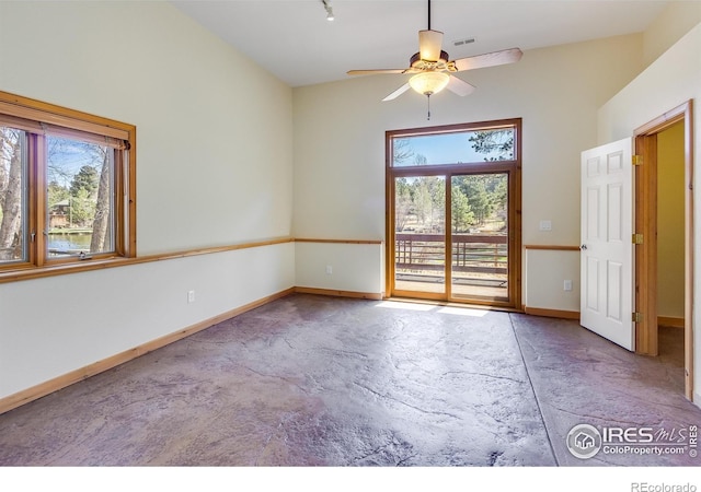 unfurnished room featuring ceiling fan