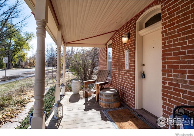 wooden terrace with covered porch