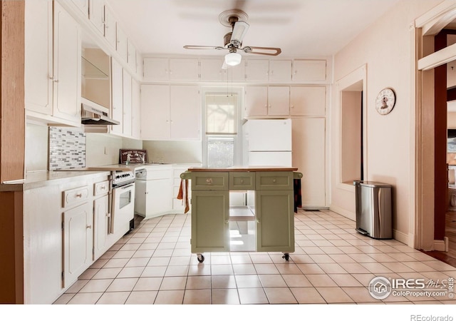 kitchen featuring white cabinets, green cabinets, ceiling fan, a kitchen island, and white range oven