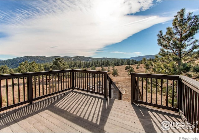 580 Saddle Notch Rd, Loveland, CO 80537 - wooden terrace featuring a mountain view