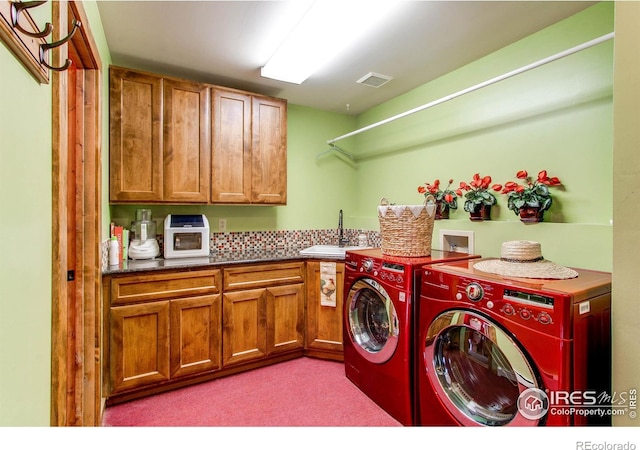 580 Saddle Notch Rd, Loveland, CO 80537 - laundry area with washer and dryer, cabinet space, and carpet floors