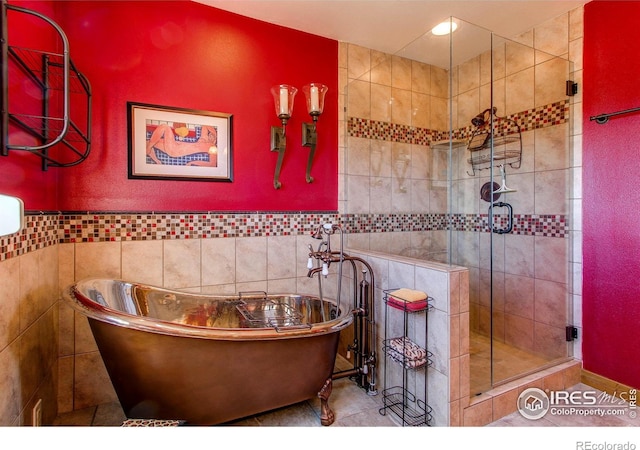 580 Saddle Notch Rd, Loveland, CO 80537 - bathroom with a shower stall, tile patterned flooring, and a freestanding bath