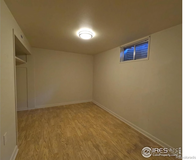 basement featuring light hardwood / wood-style flooring