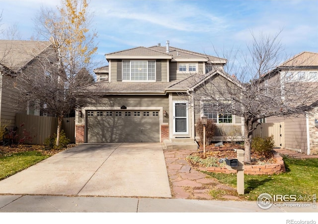 view of front of property with a garage