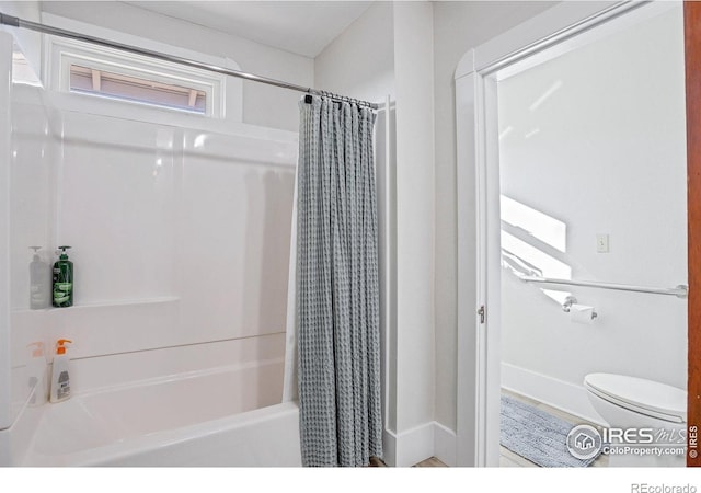 2981 W 144th Ave, Broomfield, CO 80023 - full bath with shower / tub combo, toilet, and baseboards