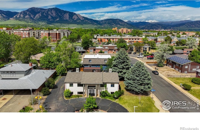 drone / aerial view featuring a mountain view