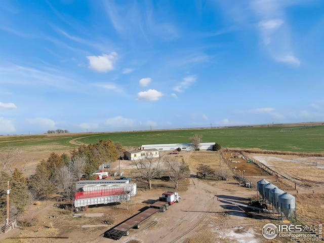 birds eye view of property with a rural view