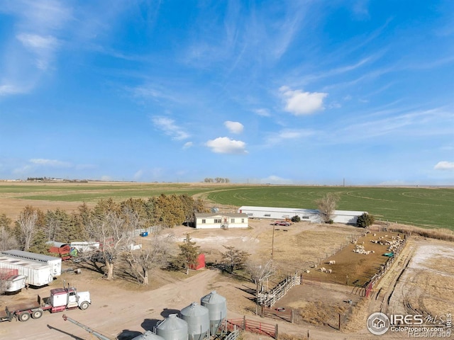 birds eye view of property with a rural view