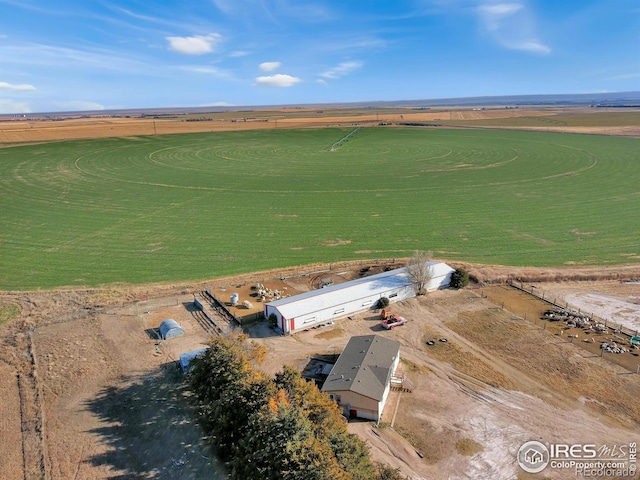 birds eye view of property with a rural view