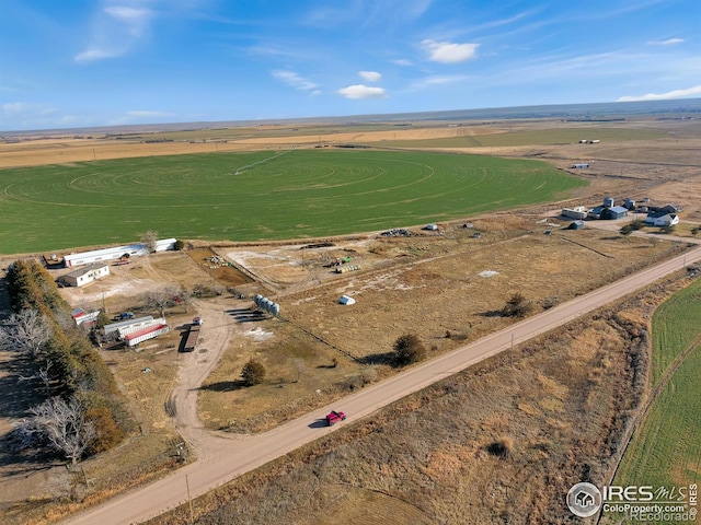 birds eye view of property featuring a rural view