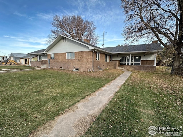 exterior space with a front yard