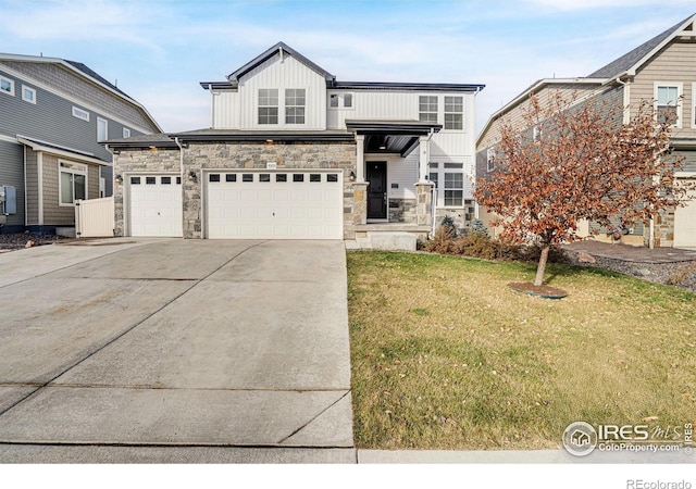 view of front facade with a front lawn and a garage