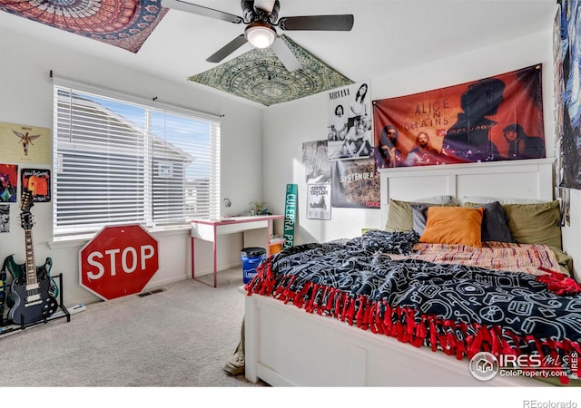 bedroom featuring carpet floors and ceiling fan