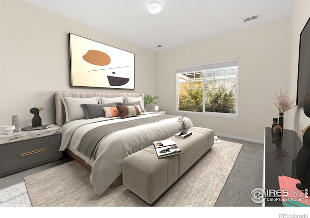 bedroom featuring baseboards, visible vents, and light colored carpet