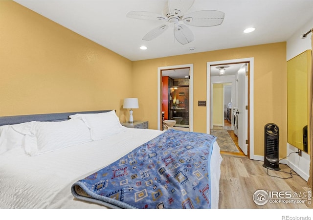 bedroom featuring light wood-type flooring, ensuite bath, and ceiling fan