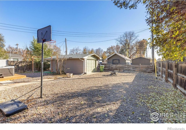 view of front of house featuring a garage and an outdoor structure