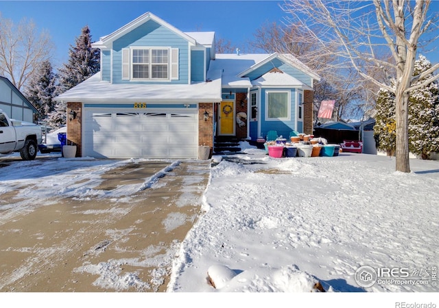 view of front of property featuring a garage