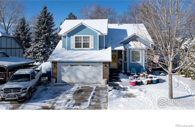 view of front of property with a garage