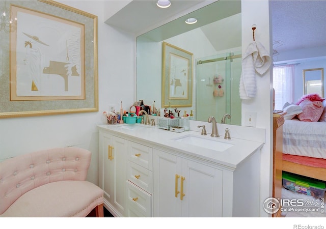 bathroom featuring vanity and walk in shower